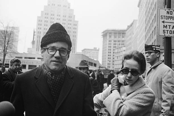(Original Caption) Reverend William Sloane Coffin Jr., 43 the Chaplain at Yale University and his wife are seen here as he appeared at the U.S. District Court in Boston. Reverend Coffin, Dr. Spock and three other defendants pleaded innocent to charges of conspiring to aid young men in dodging the draft.